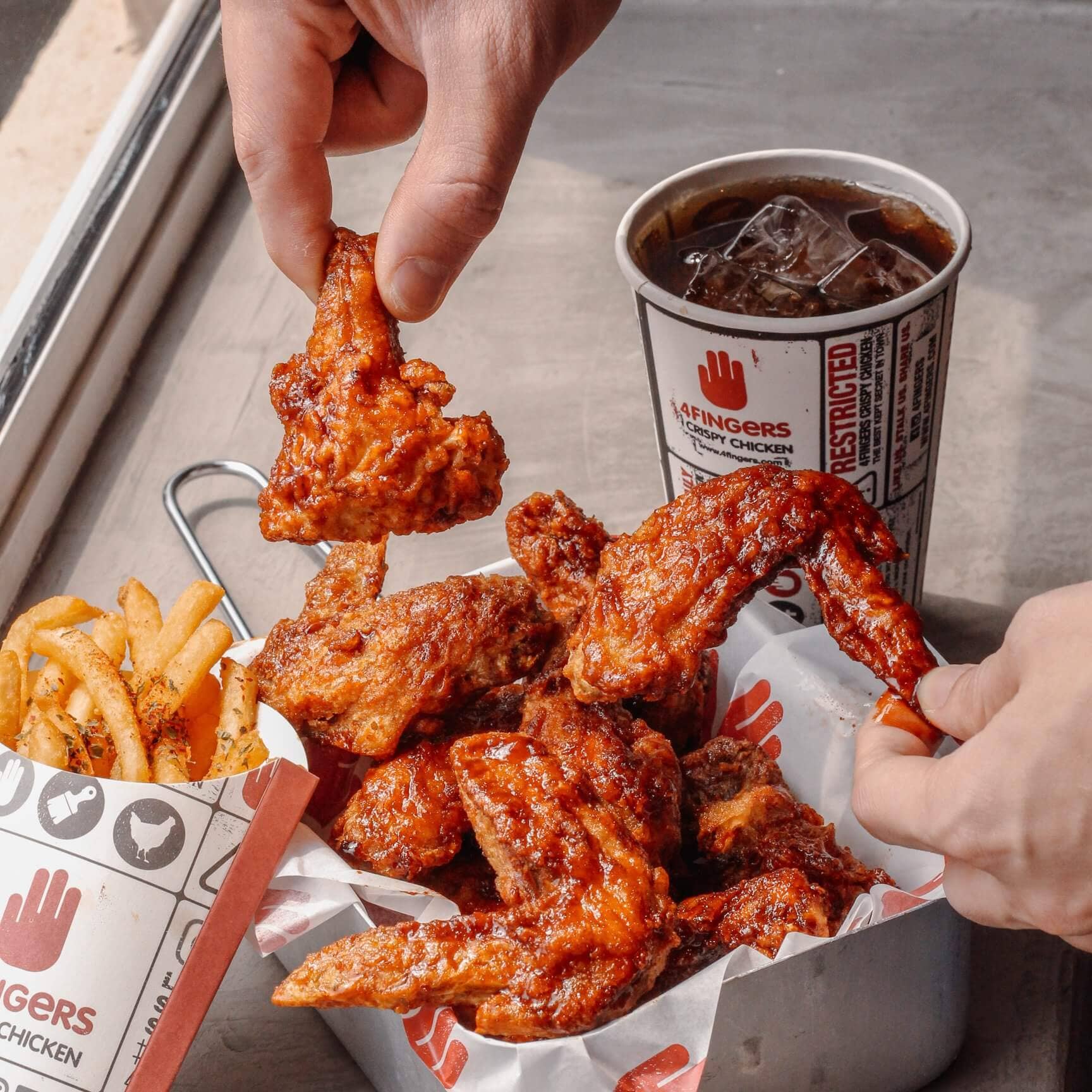 Eat all your life’s worries away with tender chicken wings from 4Fingers!