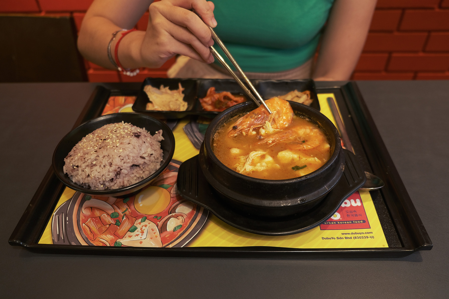 A pot of hearty Soondubu Jiggae will give you the comfort of a Korean mom's cooking.